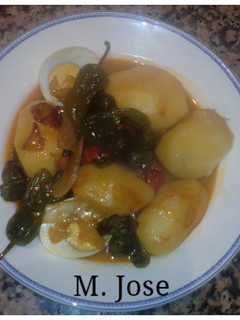 Una foto de Patatas con pimientos