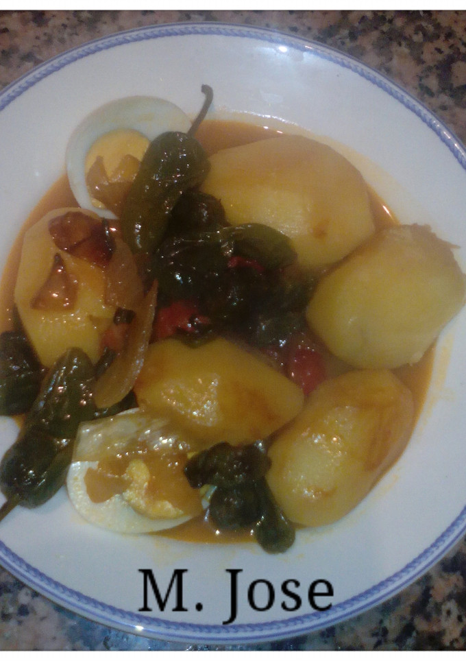 Una foto de Patatas con pimientos