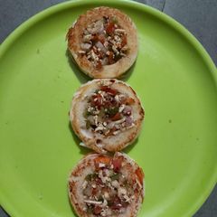 Mini paneer uttapam A picture of Mini paneer uttapam.