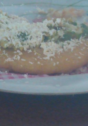 Una foto de Arepa frita con Salteado de Calabacín