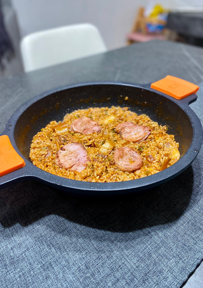 Una foto de Arroz de solomillo y panceta
