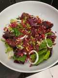 Salad with crispy Iberian ham and pomegranate