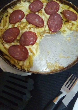 Una foto de Papas fritas a la pizza 🍟🍕