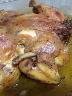 Una foto de Pollo asado lento en su jugo