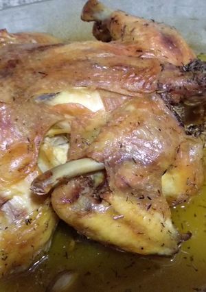 Una foto de Pollo asado lento en su jugo