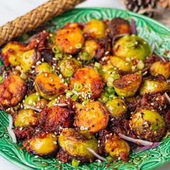 A picture of Festive Pan Fried Brussel Sprouts with Sticky Gochujang Sauce 🌶 🎄.