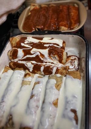 Una foto de Canelones de ricotta, jamón y queso