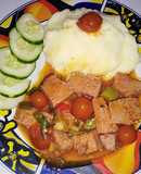 Carne de cerdo prensada con tomates cherry