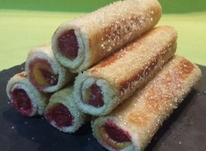 Foto principal de Canutillos de crema pastelera y frambuesas