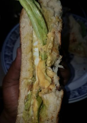 A picture of Sunny side up egg sandwich.