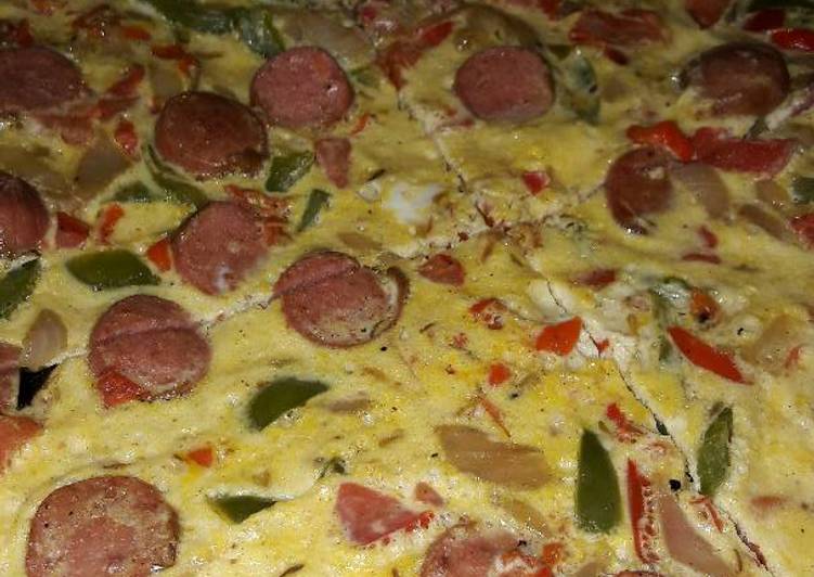 Sauted veggies, sausage mixed in eggs and bakefried