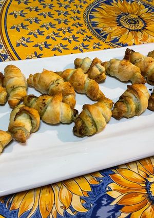 A picture of Mini Puff Pastry Croissants with Celery Pesto and Parmesan.