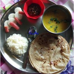 A picture of Daal chawal roti.