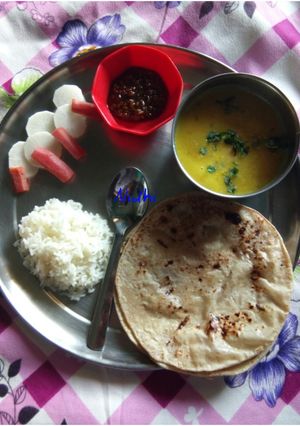 A picture of Daal chawal roti.