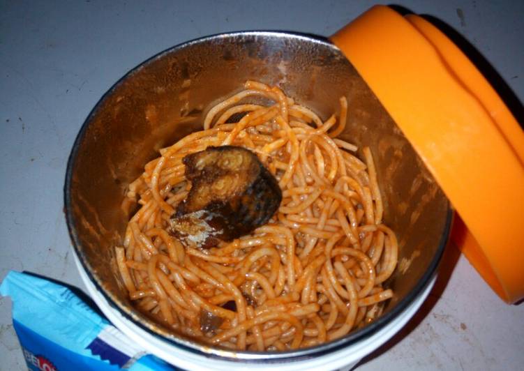 Jollof spaghetti with fried fish