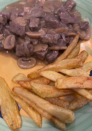 Una foto de Lomo con Salsa de Champiñones