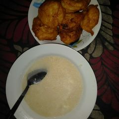 A picture of Garri and water yam akara.