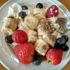 A picture of Yogurt ice cream with fruit.