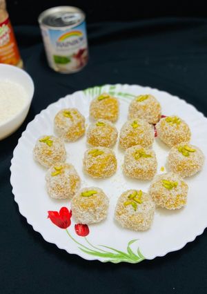 A picture of Mango coconut ladoo with condensed milk.