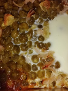 Una foto de Huevo al plato con guisantes