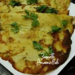 A picture of Moong Daal Dosas or Yellow Lentil Dosas.