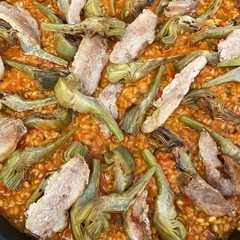 Foto principal de Arroz con alcachofas y secreto ibérico