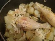 Una foto de pollo frita y patata