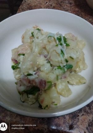 Una foto de Papas con crema tipo Alfredo