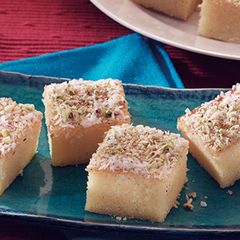 A picture of Basbousa with Yogurt.