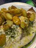 Pez espada al horno con patatas y cebolla