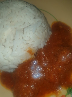 A picture of Ram meat Stew and Rice.