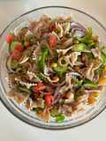 Salad with Farfalle, Chickpeas, Feta, Oregano, Mint, Tomato, Cucumber, Garlic, Onion, Bell Pepper, and Olives