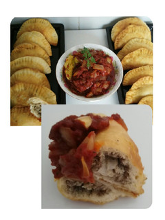 Una foto de Empanadillas de Sardinas con salsa de tomates encebollados