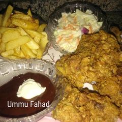 Homemade KFC chicken with salad A picture of Homemade KFC chicken with salad.