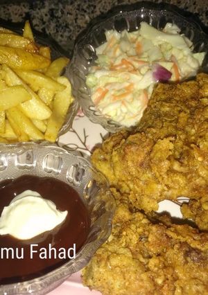 A picture of Homemade KFC chicken with salad.