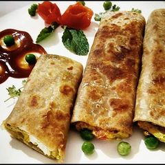 A picture of Hariyali paneer tikka roll.