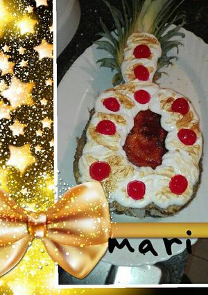 Foto principal de Piña rellena de crema de vainillla y merengue 