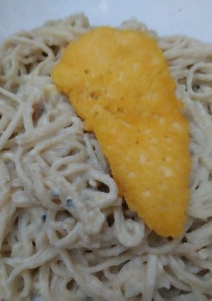 Una foto de Fideos con crema de queso azul y crocante de parmesano