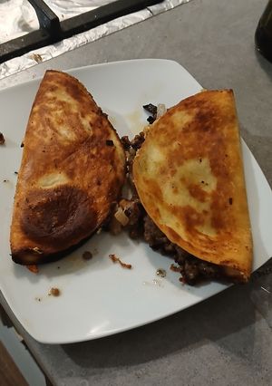 Une photo de Tacos bœuf haché et fromage fondu !