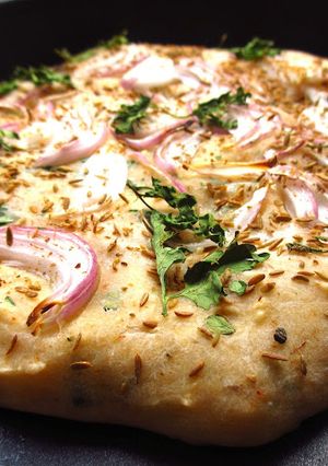 A picture of Flat bread with Indian Spices.