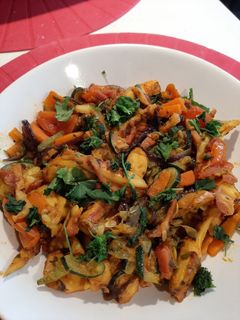 Una foto de Wok de pulpo