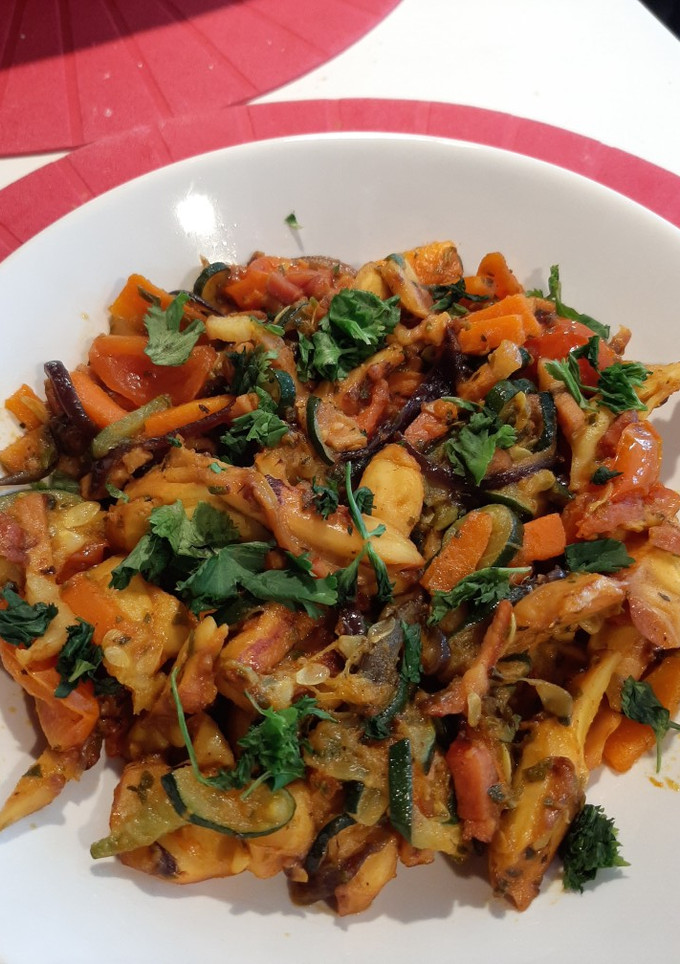 Una foto de Wok de pulpo
