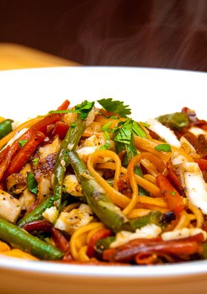 A picture of Sriracha Linguine with Pan-fried Tilapia.