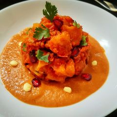 A picture of Banarasi Tomato Chat.