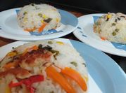 Una foto de arroz sobrante de paella