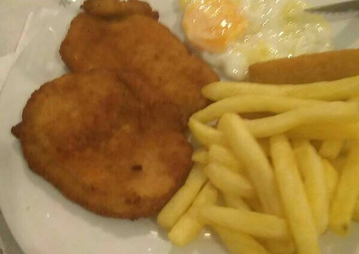 434 Pechuga rebozada en patatas fritas de bolsa