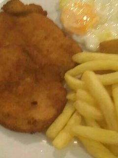 Una foto de 434 Pechuga rebozada en patatas fritas de bolsa