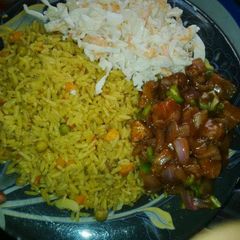 A picture of Fried rice and coleslaw.