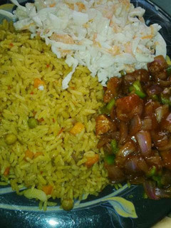 A picture of Fried rice and coleslaw.