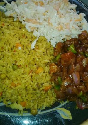 A picture of Fried rice and coleslaw.